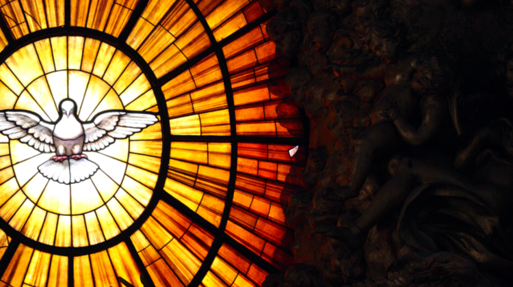 Church stained glass with a dove